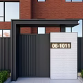 Modern Black and White Gate with Number 061011 Red Brick Building and Green Bushes