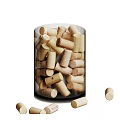 Clear Glass Jars Filled With Cork Stoppers And Scattered Cork Pieces On White Background