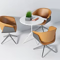 Modern White Round Table With Orange Gray Chairs Silver Metal Legs Potted Plant And Books