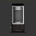 Black Portable Heater With Metal Mesh Cover And Control Knob On Smooth Surface