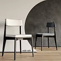 Wabi Sabi Style Dining Chairs with White and Dark Upholstered Seats and Wooden Frames