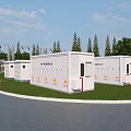 Outdoor Charging Station With Multiple White Units Yellow Warning Signs And Roadside Green Grass Trees