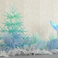 Ocean Themed Decor With Blue Coral Mermaid Tail And Green Plant Accents