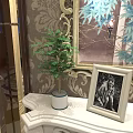 Elegant Bonsai Potted Plant on White Table with Patterned Wallpaper and Decorative Picture Frame