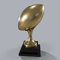 Golden Football Trophy with Shiny Metallic Surface and Black Base for Sports Championship Award