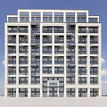 Modern Multi Story Apartment Building With White Exterior Large Windows Balconies Against Blue Sky