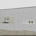 Modern White Kitchen Interior With Cabinets Countertop Fruits And Jars