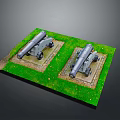 Military Cannons As Weapons Placed On Green Grass With Stone Bases