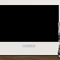Black Wall Mounted Television Against White Wall with Stacked Books and Wooden Floor