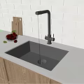 White Countertop Kitchen Sink with Faucet Running Water Wooden Cutting Board and Bowl of Cherries