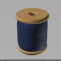 Wooden Spool Of Blue Thread For Daily Sewing And Craft Use