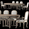 Classic Dining Table Set with Carved Details Armchairs Oval Wooden Table and Light Upholstered Seats