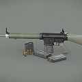 Military Rifle With Green Stock Black Components Magazines And Bullets On Gray Surface