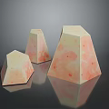 Stone Wood Decorative Pieces With Various Sizes And Textured Peach Surfaces