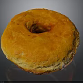 Freshly Made Orange Glazed Donut With Shiny Surface And Central Hole