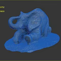 Blue Elephant Sculpture With Intricate Design On Natural Stone Base