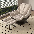 Beige Comfortable Lounge Chair With Ottoman On Checkered Rug By Window With Trees