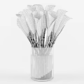 White Calla Lilies Arranged in Transparent Glass Vase with Green Stems and Water