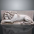 Stone Lion Sculpture Reclining With Curly Mane On Dark Background With Reflection