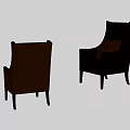 Two Modern Black and Brown Upholstered Armchairs with Minimalist Design and Slim Legs