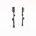 Two Traffic Lights With Red Yellow Green Signals On Black Poles
