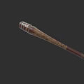 Traditional Wooden Weapon With Metal Reinforced Handle And Detailed Carved Design