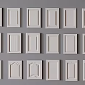 Collection of Different Style White Cabinet Doors Arranged on Gray Wall