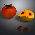 Fresh Whole Persimmon and Halved Persimmon with Seeds Showing Juicy Flesh
