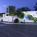 Modern Green Community Fence Decorated with Lush Plants in Night Scene and Pedestrians