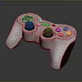 White Game Controller With Black Joysticks And Colored Action Buttons