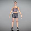 Woman Standing in Sports Bra Shorts and Sneakers Against Gray Background