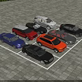 Multiple Different Colored Cars Neatly Parked in Paved Parking Lot Area