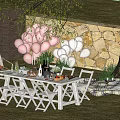Charming Garden Patio With Pink White Balloons White Folding Chairs Stone Wall And Picnic Mat
