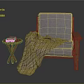 Gray Cushioned Chair With Wooden Armrests Plaid Blanket And Cross Legged Side Table With Books