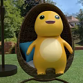 Yellow Inflatable Cartoon Figure Sitting On Hanging Rattan Swing Under Umbrella In Garden