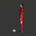 Man In Red Liverpool Football Jersey Number 2 Standing With Soccer Ball On Grey Background