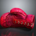 Red Leather Boxing Glove With White Laces On Dark Background