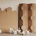 Brown Room Divider With Curved Panels Circular Motifs And Small Animal Toys