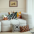 Modern Decorative Throw Pillows With Leaf And Geometric Patterns On Cozy Sofa