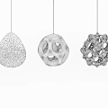 Modern Pendant Lights with Three Unique Decorative Designs Hanging Against Dark Background Lit and Stylish
