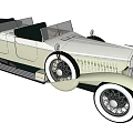Vintage Cream Colored Convertible Car With Open Top And Wire Spoke Wheels