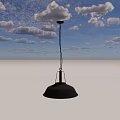 Black Metal Industrial Pendant Light Hanging Over White Brick Wall Interior