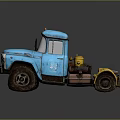 Vintage Blue and Yellow Truck with Weathered Exterior and Classic Design Features