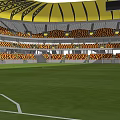 Football Stadium Featuring Yellow Curved Roof And Orange Black Seats On Green Field