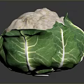 Natural Organic Fresh Cauliflower With Green Leaves On Dark Surface