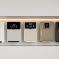 Various Colored Modern Household Appliances Featuring Digital Displays Arranged On Kitchen Shelf