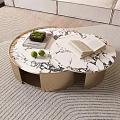 Modern Round Coffee Table With Marble Top Beige Base Green Plant Limes And Open Book