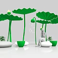 Relaxing Area With Large Green Lotus Leaves Water Droplets And Seated Person On White Cushions