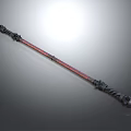 Ornate Staff Weapon with Intricate Carved Metal Ends and Red Shaft Design