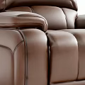 Comfortable Brown Leather Massage Chair With Ergonomic Design And Stitching Details